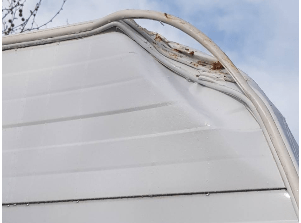 Damaged aluminium cladding and framework