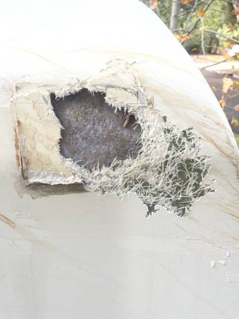 Damaged caravan in need of fiberglass repair